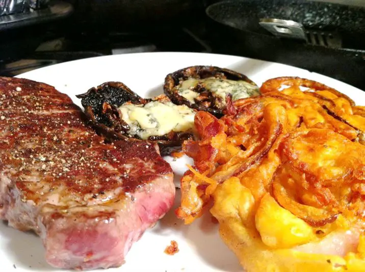 Sirloin Steak with Beer-Battered Red Onion Fritters and Blue Cheese-Stuffed Portobello, Lay The Table