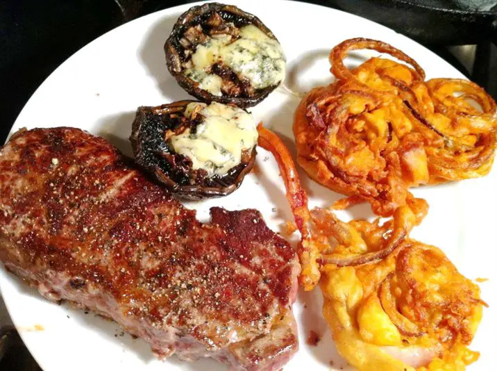 Sirloin Steak with Beer-Battered Red Onion Fritters and Blue Cheese-Stuffed Portobello, Lay The Table